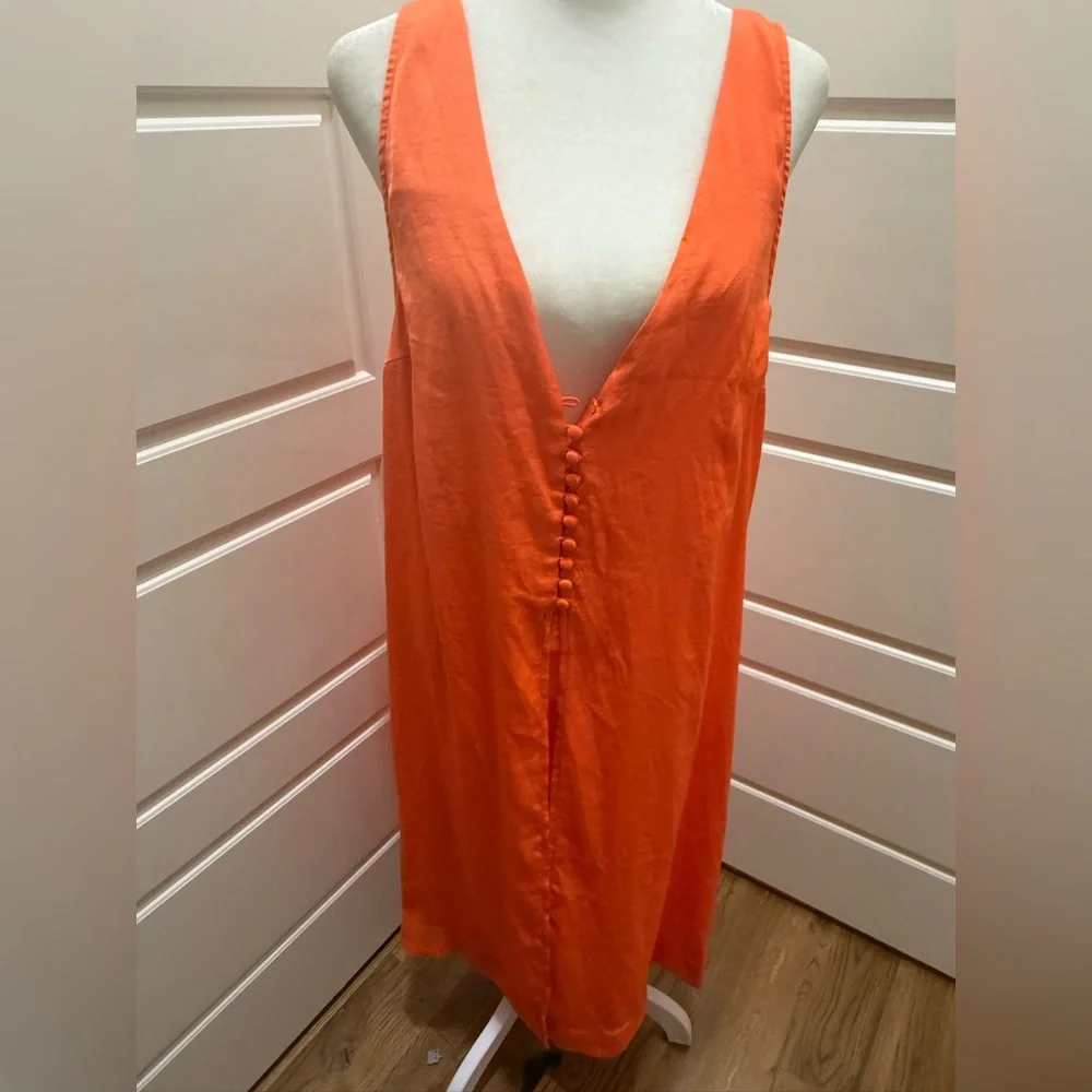 Free People. Orange Long Sleeveless Vneck Front & Back Blouse. Size 12.